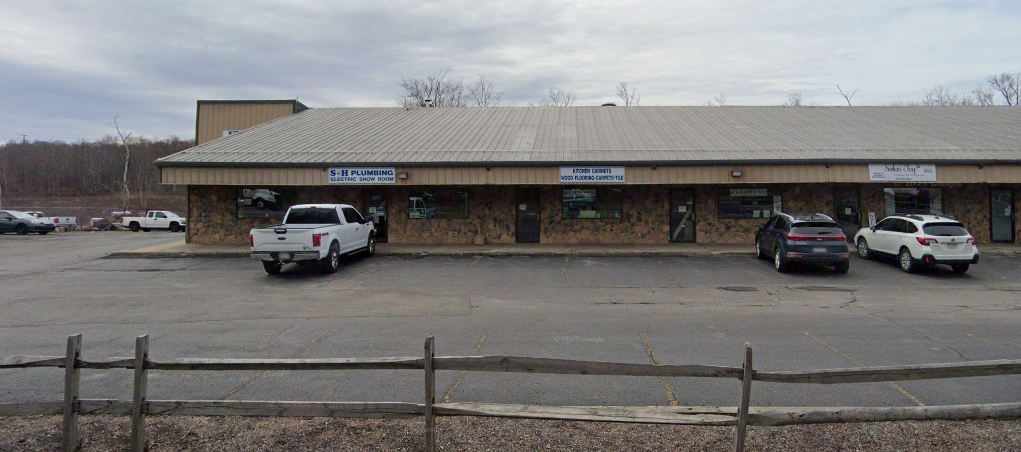 S&H Supply Co. building exterior view showing parking and storefront in Clifton Township PA